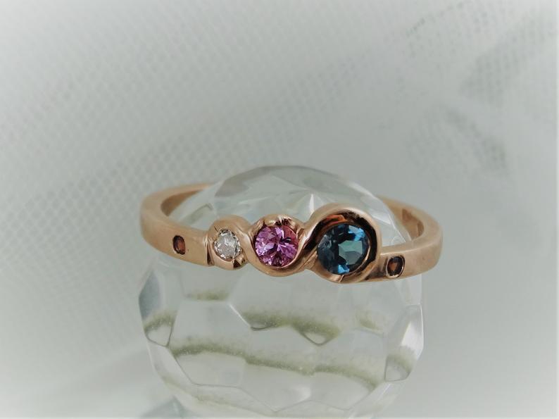 The Candy Wave Ring, 9ct Rose Gold Ring, London Blue Topaz, Pink Sapphire,Diamond and Ruby 9